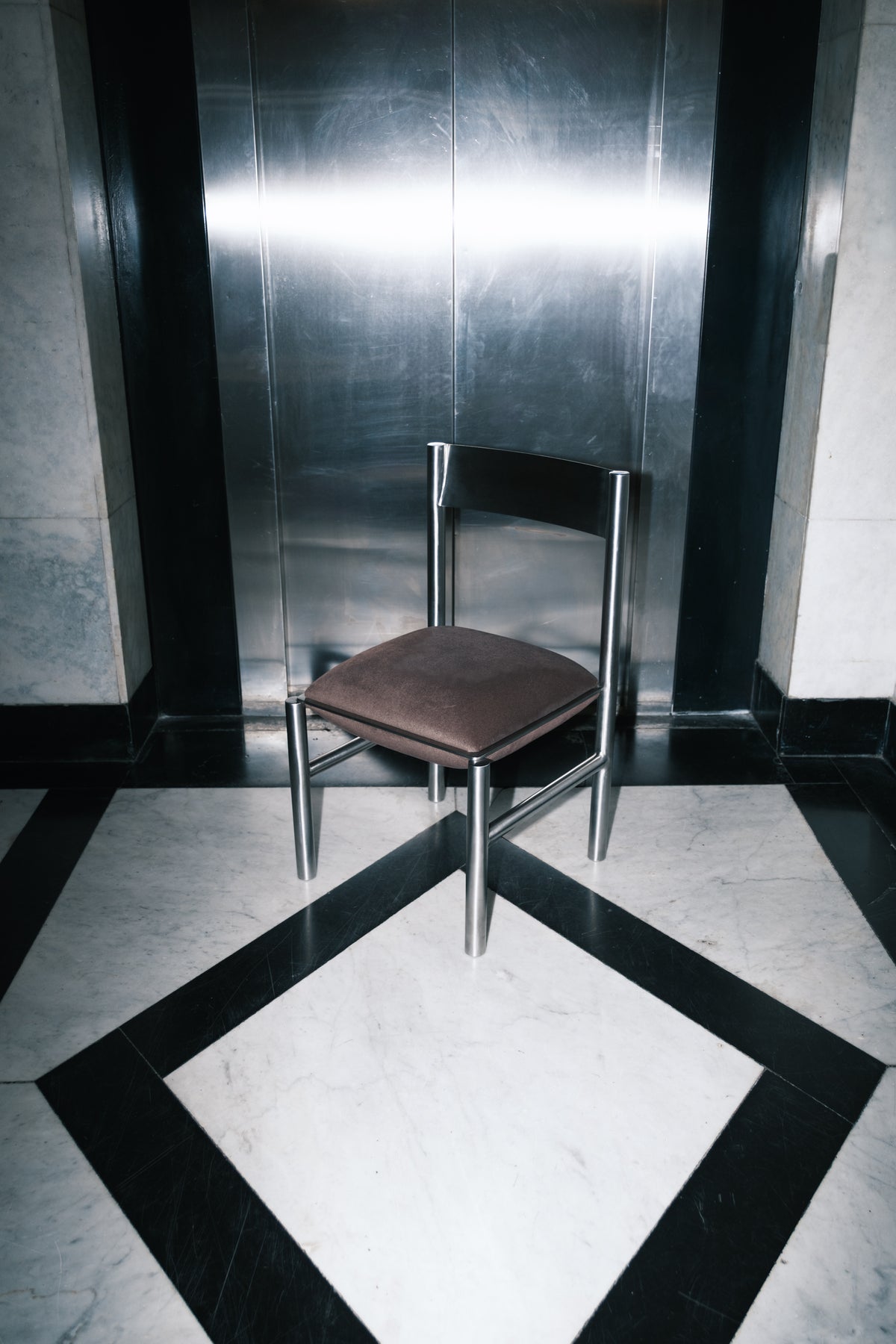 J O H N Chair | Stainless Steel + Upholstery